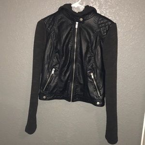 Faux leather jacket with knitted arms